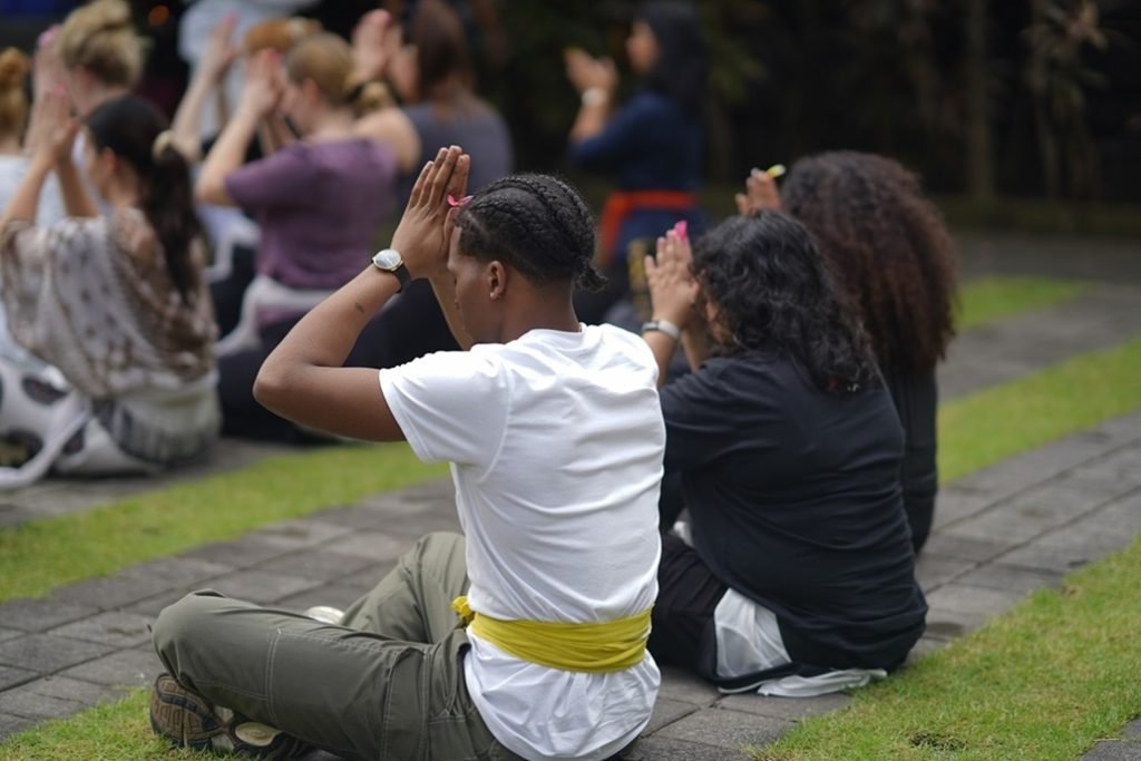 Students doing yoga in bali
