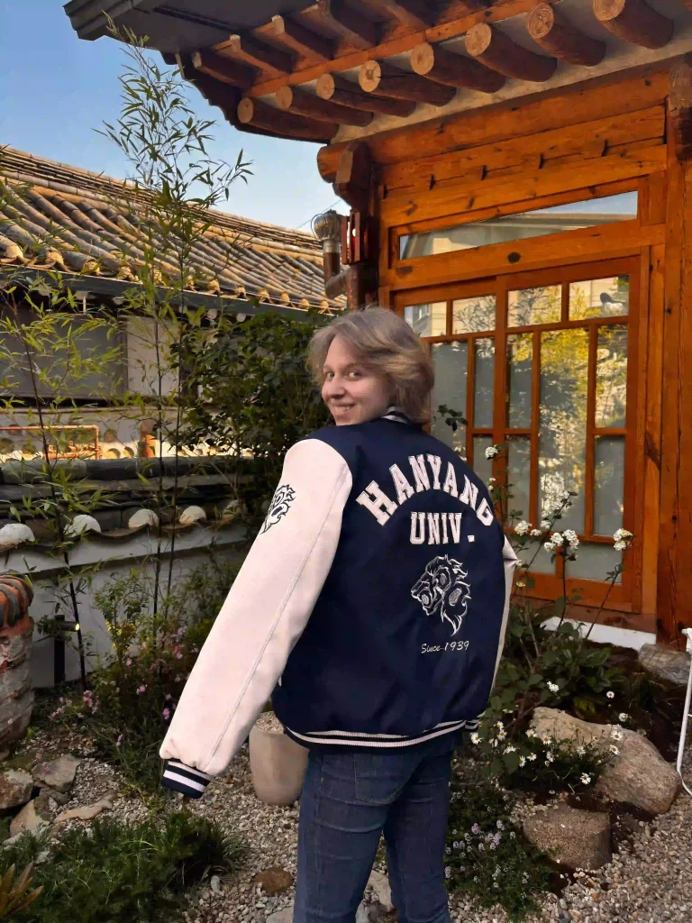 Alexandra during her semester abroad in South Korea, wearing the Hanyang University jacket